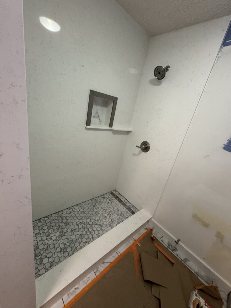 installation of groutless shower